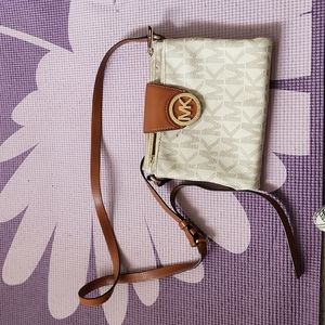 Michael Kors cross body monogram bag